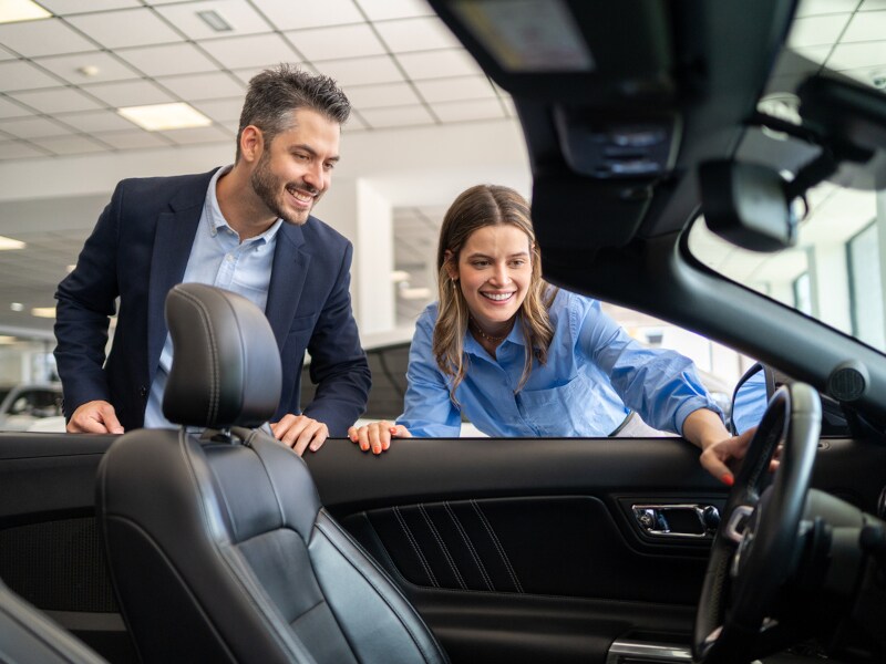 Hamilton Nissan salesperson helping a customer