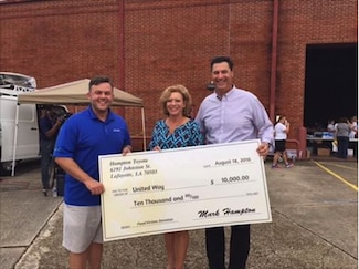 Hampton Toyota Lafayette United Way Flood Donation.png