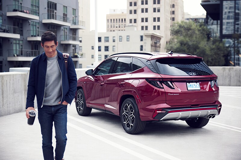 Still of a man walking away from his 2022 Hyundai Tucson N-line