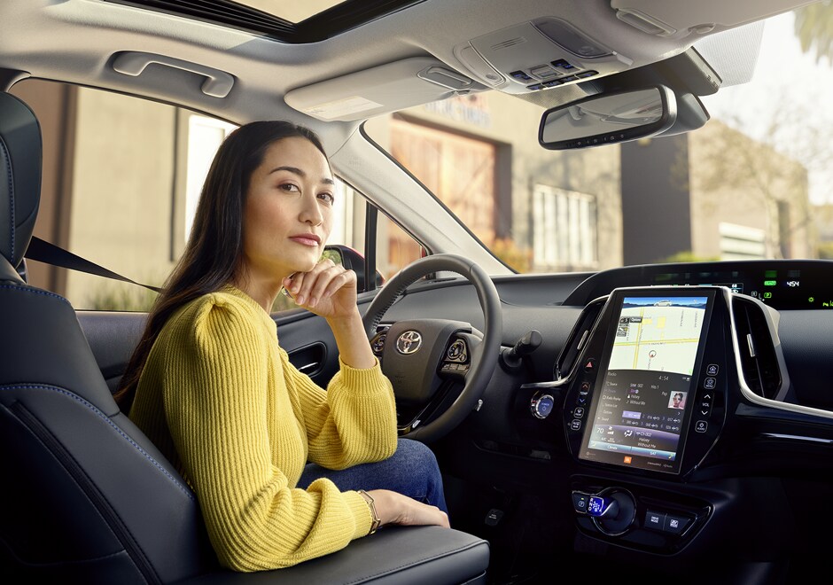 Woman sitting in a 2022 Toyota Prius Limited