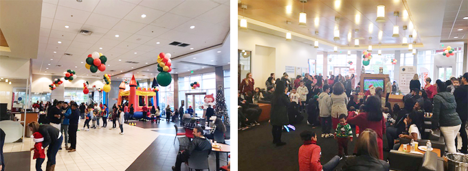 Hanlees Richmond Toyota employees and guests celebrating inside the dealership showroom during the Employees' Kids Christmas Party