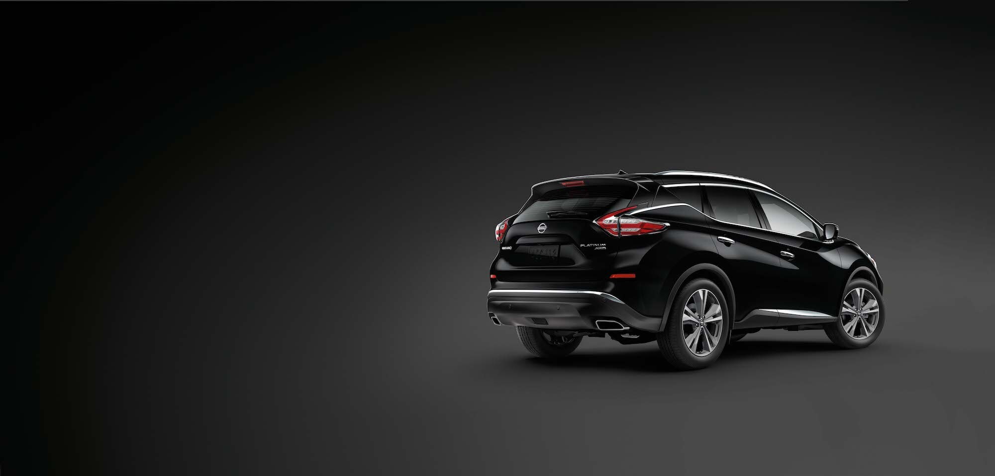 Features of the 2019 Nissan Murano at Hanover Nissan | The rear view of the Black 2019 Murano on a dark background Features of the 2019 Nissan Murano at Hanover Nissan | The rear view of the Black 2019 Murano on a dark background
