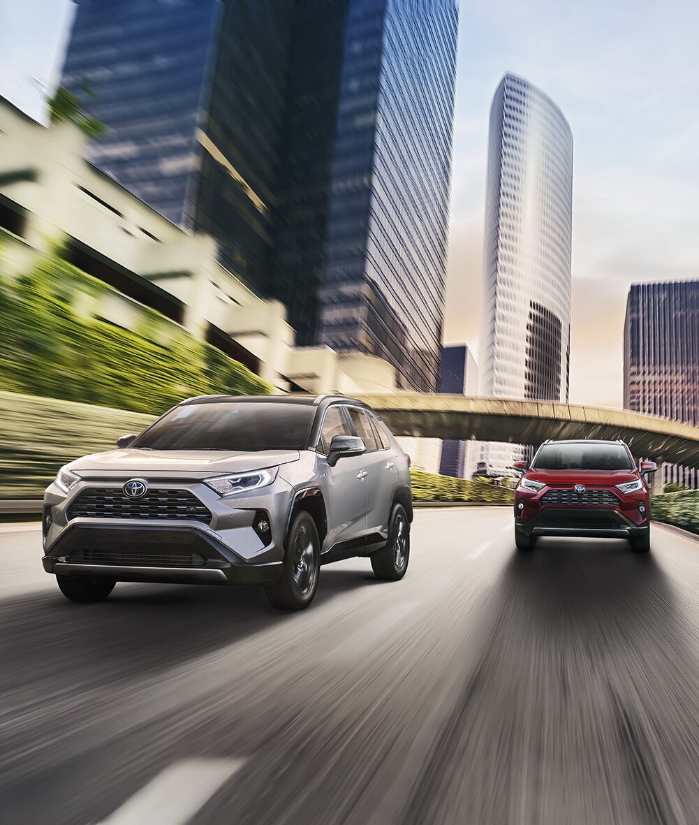 A Hybrid for Everyone at Hanover Toyota | Two RAV4 hybrid racing on the street