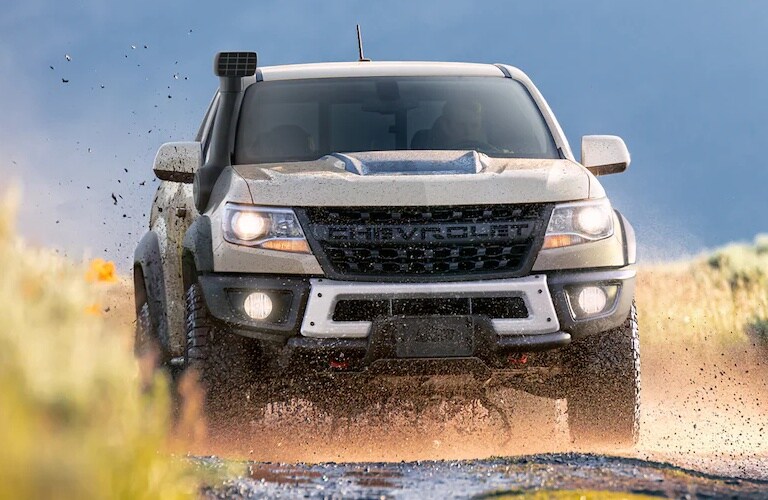 2022 Chevy Colorado tan front view in the desert 2022 Chevy Colorado tan front view in the desert