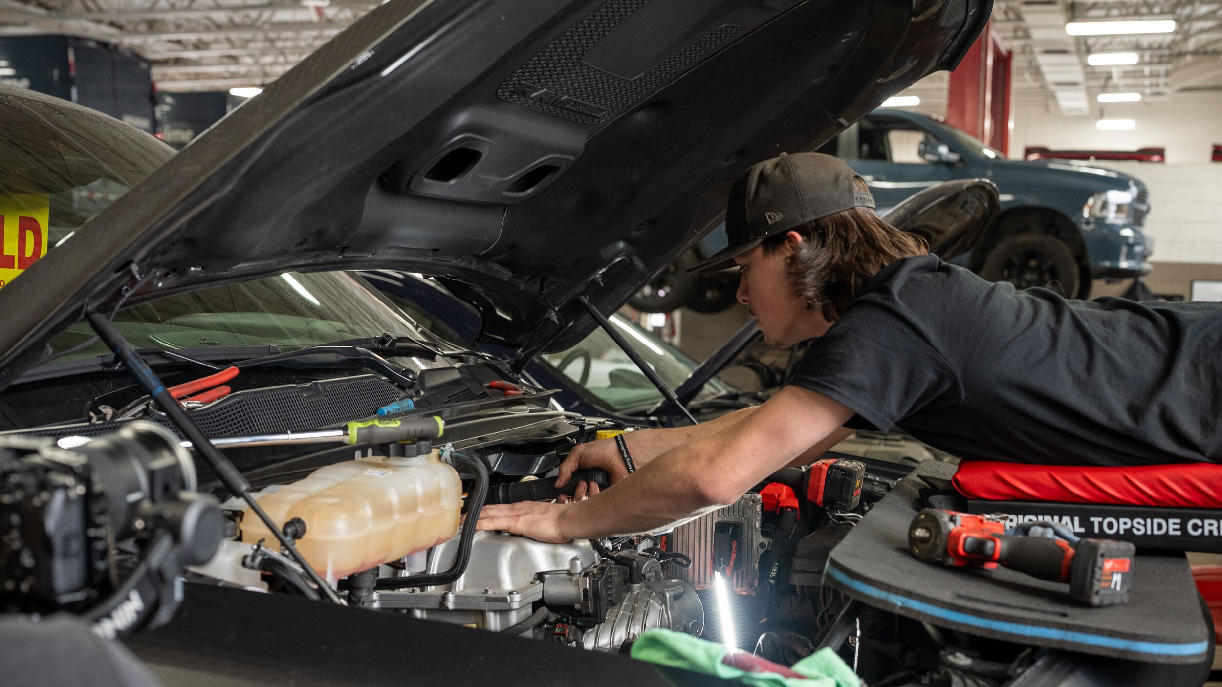 A certified technician servicing a vehicle at Zeigler Grandville
