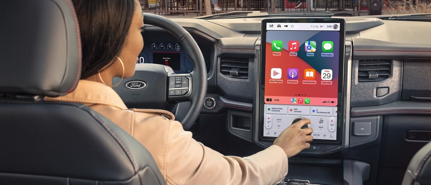 Driver Using New LCD Touchscreen in 2024 Ford Expedition