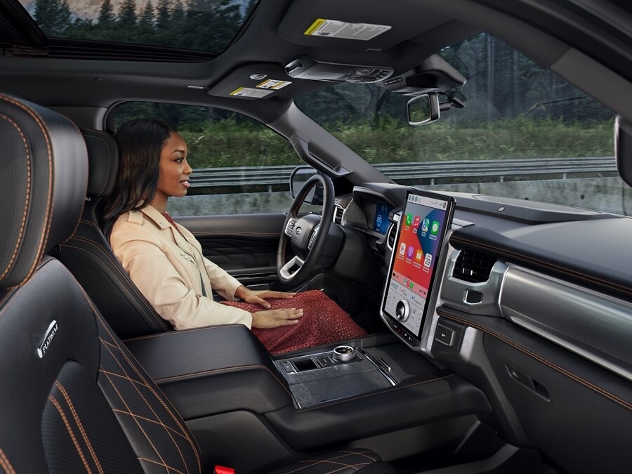 Driver Using Hands-Free Highway Driving Option