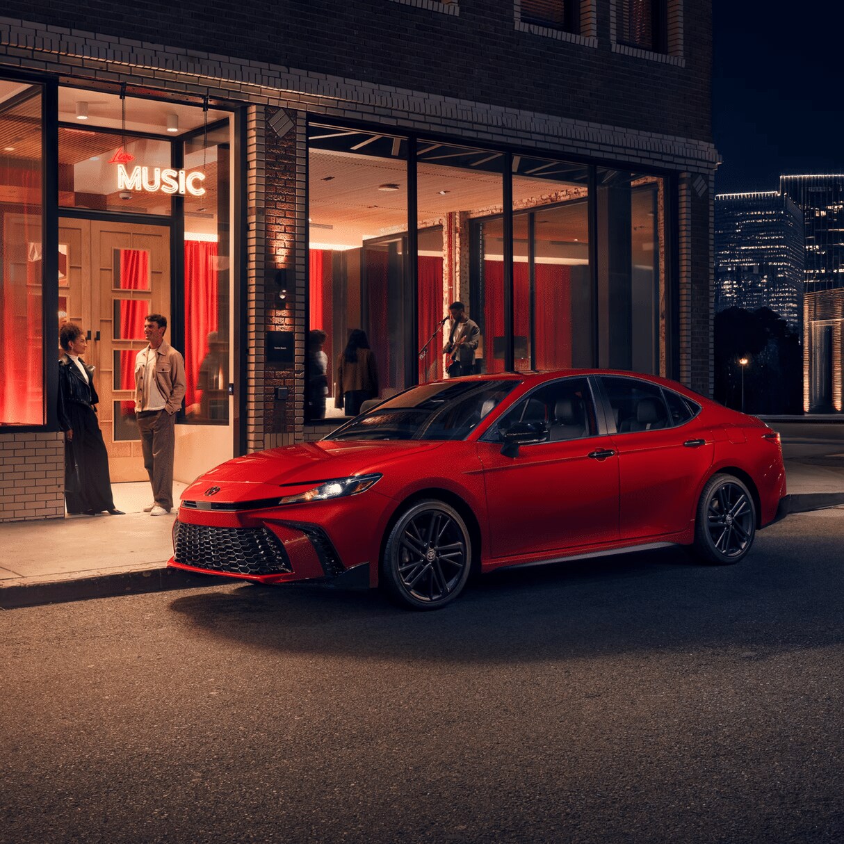 2026 Toyota Camry driving on a scenic road near Silverdale, Washington.