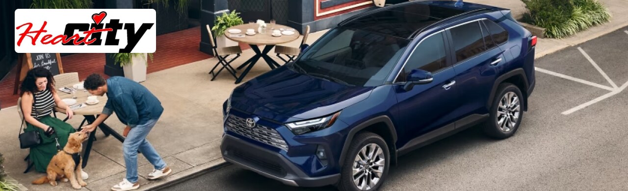 Toyota-RAV4-Adventure-Awaits-with-This-Versatile-SUV.png Heart City Toyota dealership showcasing a lineup of Toyota RAV4 SUVs in Elkhart, IN.