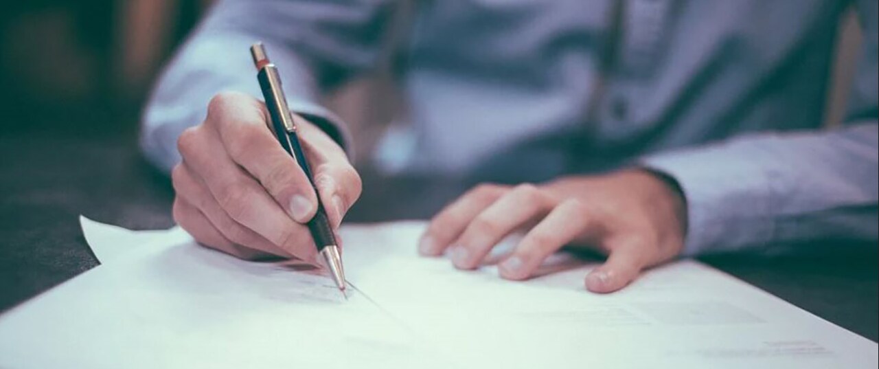 signing documents.PNG