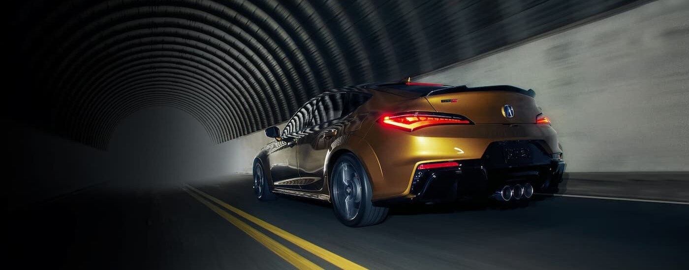 2024%20Acura%20Integra%20Type%20S%20-%20Tunnel.jpg Orange 2024 Acura Integra driving through a tunnel