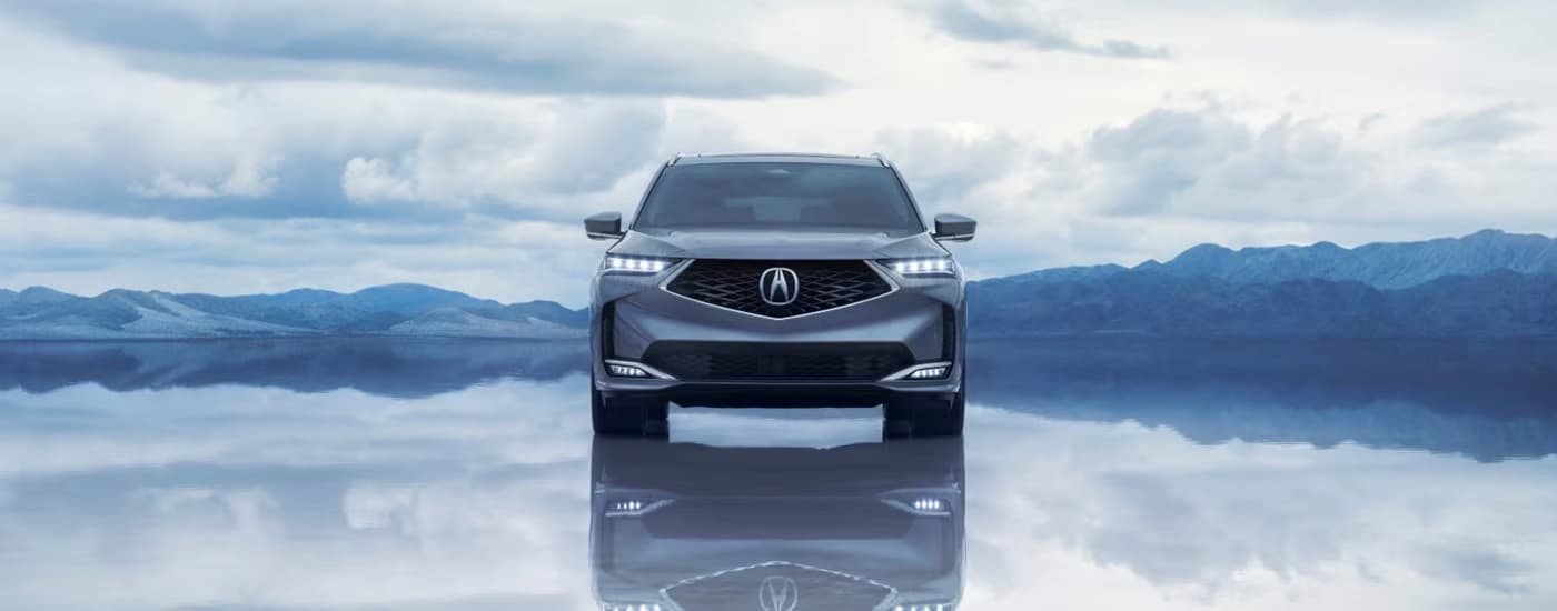 Front of a parked grey 2026 Acura MDX.