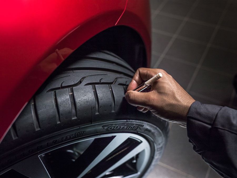 Jaguar-tire-tread-check.jpg