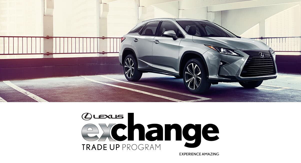 lexus auto technician perfoming service maintenance
