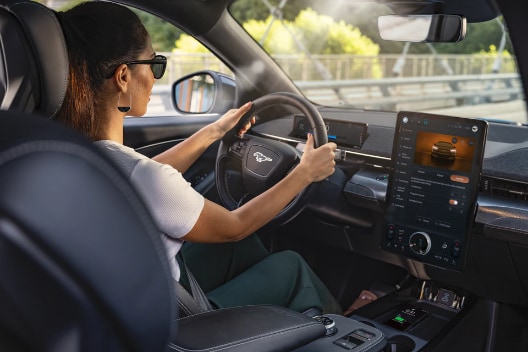 New Ford Mustang Mach-e interior view of woman driving