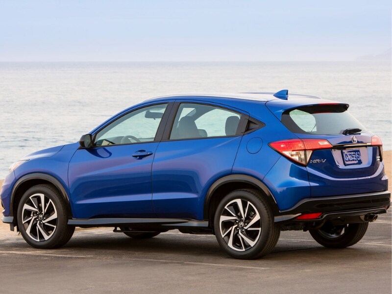 Back Side Exterior of a blue 2019 Honda HR-V in a parking spot by the ocean shore
