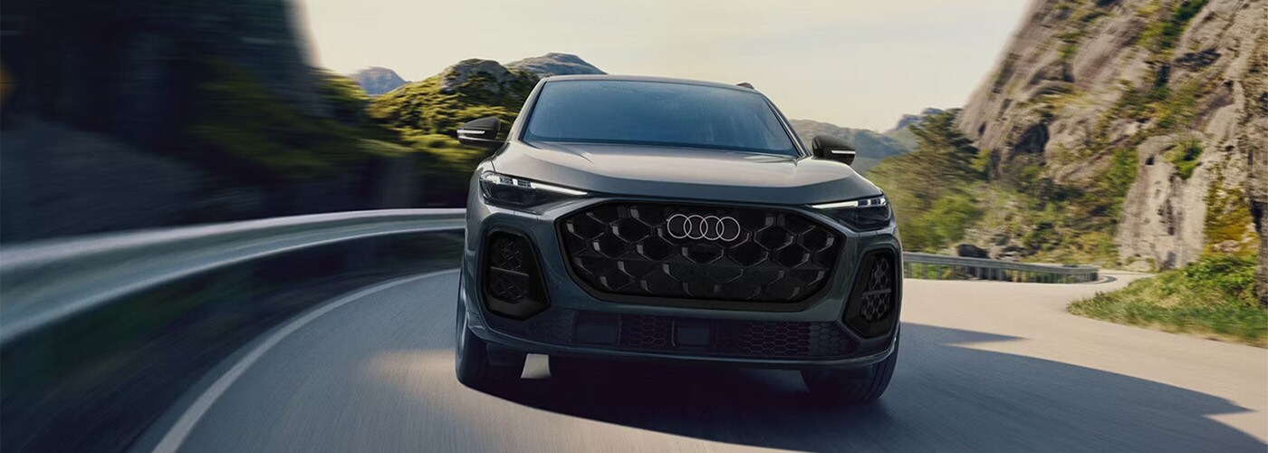 All-New next-gen Audi Q5 photo, front view on highway. All-new, next-gen Audi Q5 coming to Audi Newmarket! Be among the first to drive one! Front view Photo on highway shown.