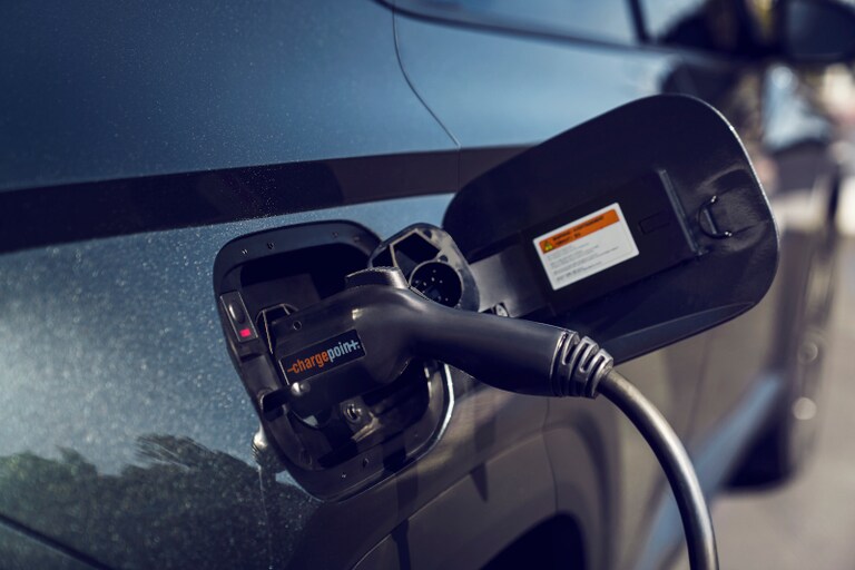 Hyundai vehicle plugged into a home charging station