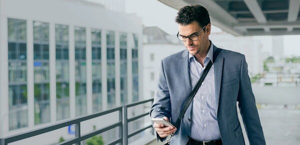 Man utilizing Ford + Alexa app.png