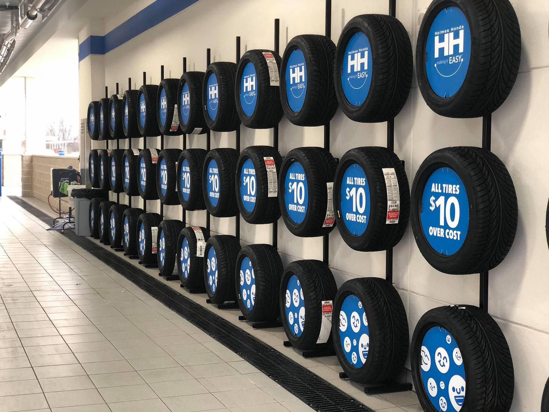 holmes honda bossier city tire center $10.00 over cost everyday