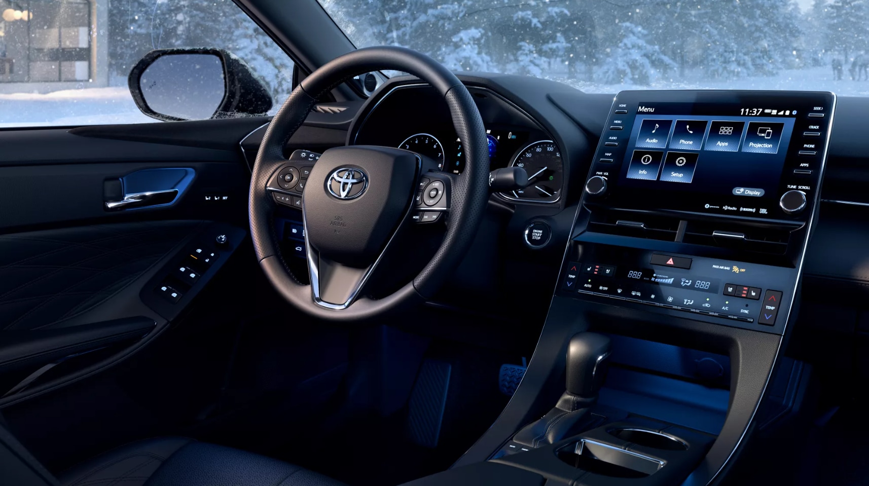 2022-Toyota-Avalon-Hybrid-5.PNG a view of the dash in all black of a 2022 Toyota Avalon Hybrid with infotainment center