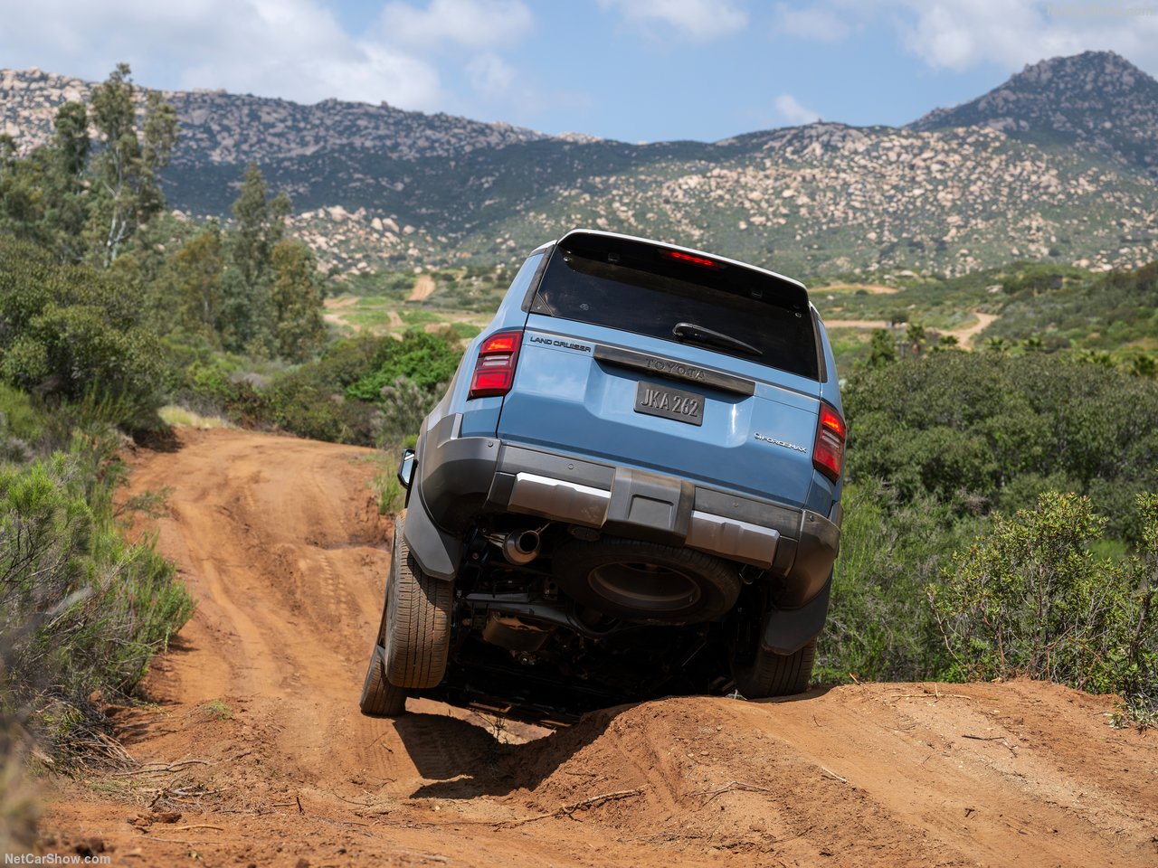 2026 Toyota Land Cruiser in a classic color showing its boxy, rugged design