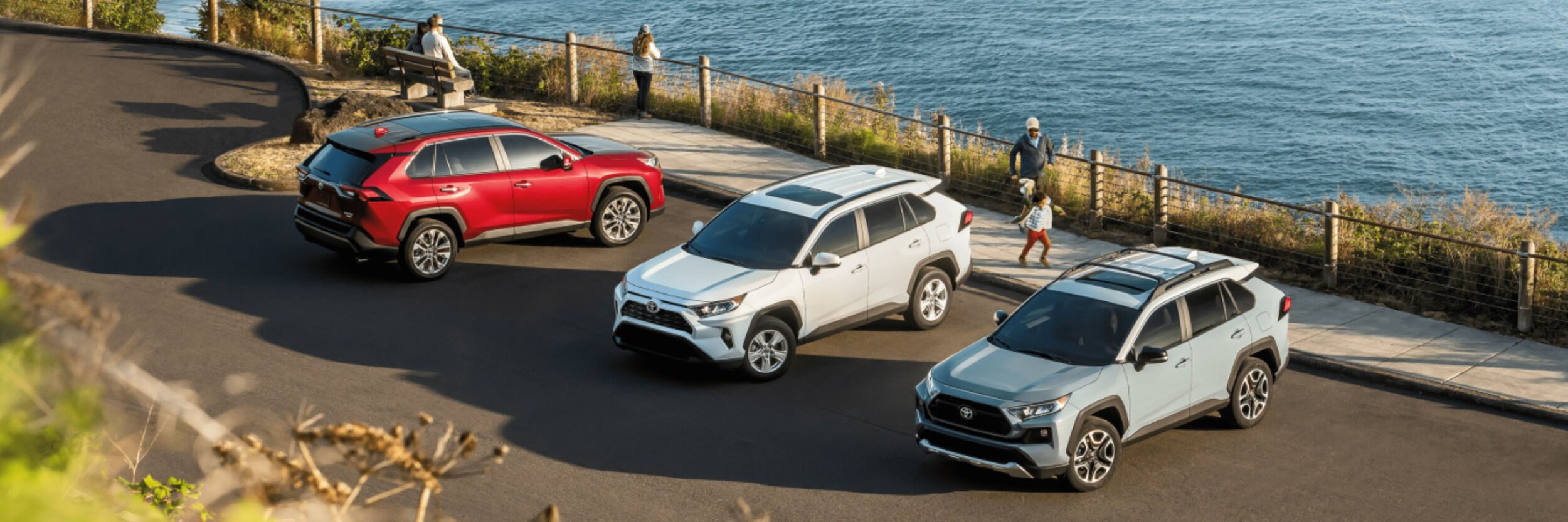 2022 Vs. 2021 RAV4 Models Parked in Front of a Lake 2022 Vs. 2021 RAV4 Models Parked in Front of a Lake