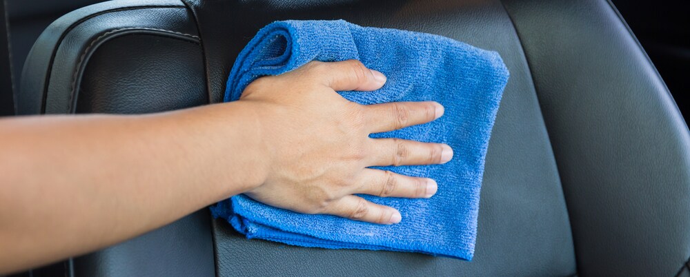 Person Cleaning Leather Car Seats.jpg