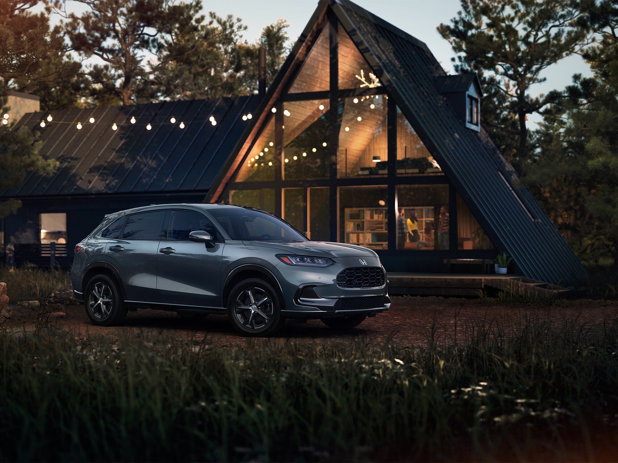 silver Honda HR-V parked in front of an A-frame cabin