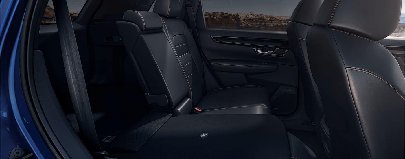 Honda%20CR-V%20for%20Sale%20-%202024%20Honda%20CR-V%20Sport%20Touring%20Hybrid%20-%20Interior.jpg The black interior of a 2024 Honda CR-V Sport Touring for sale.