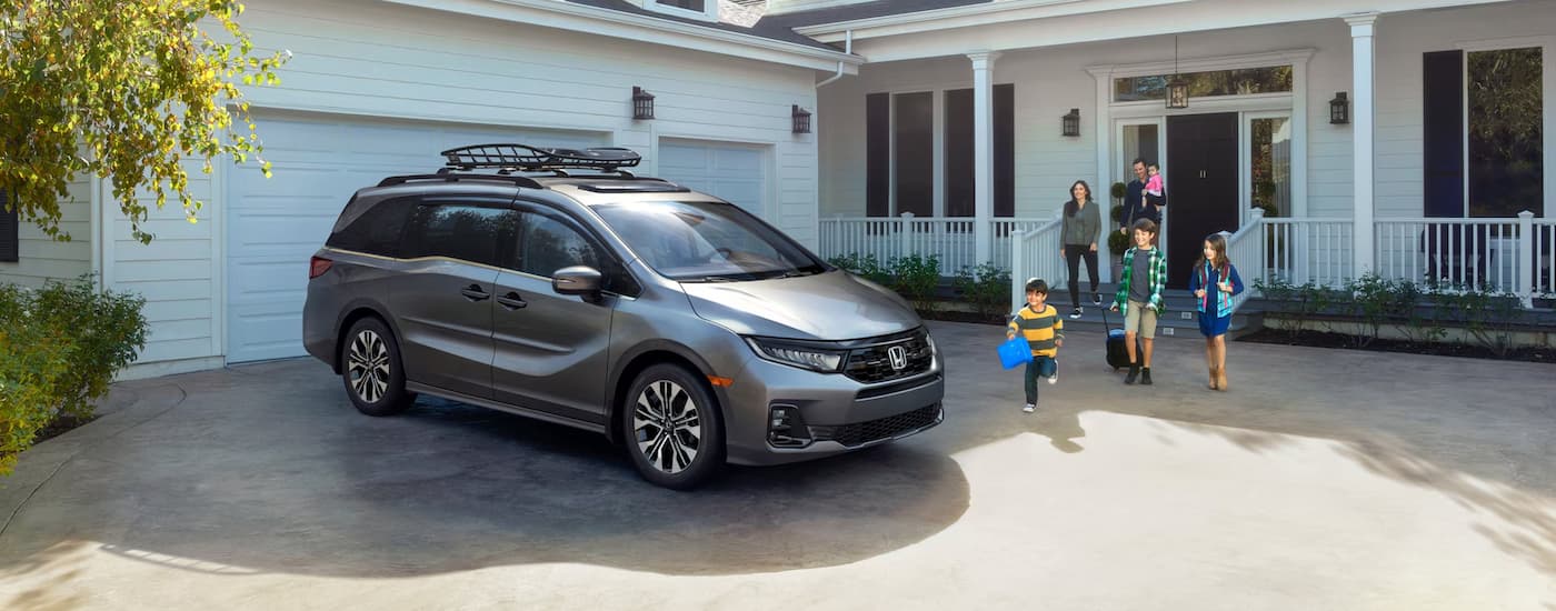 Honda%20Dealer%20Near%20Plymouth%20-%202025%20Honda%20Odyssey%20Elite%20-%20Grey%20Driveway.jpg A grey 2025 Honda Odyssey Elite parked on a driveway after leaving a Honda dealer near Plymouth.