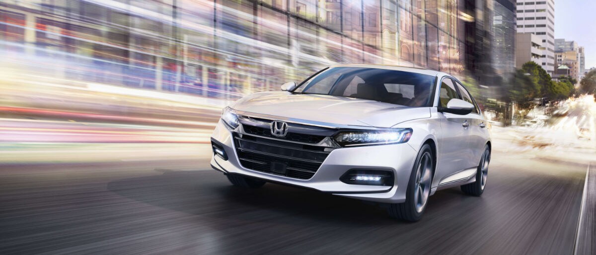 2020 Honda Accord driving down a road