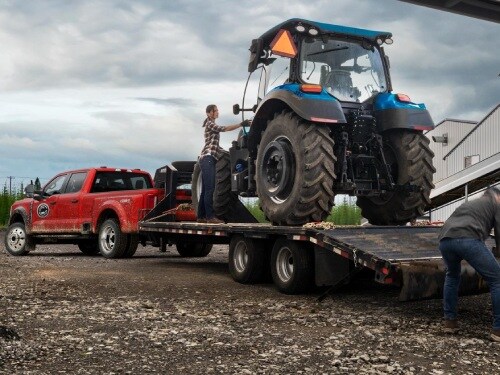 2026 Ford F-250 towing a tractor