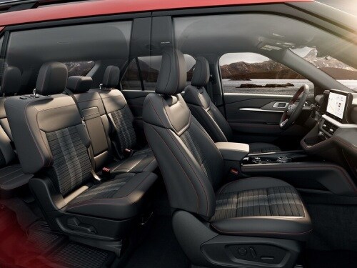 Side interior view of front and back seats in the 2025 Ford Explorer