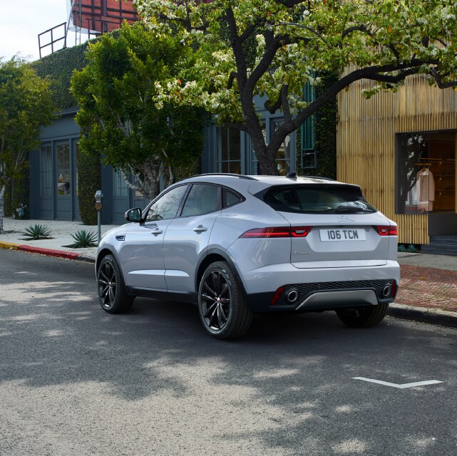 2020 JAGUAR E-PACE PARKED DOWNTOWN IN A CITY. IMAGE SHOWS WHITE E-PACE.png