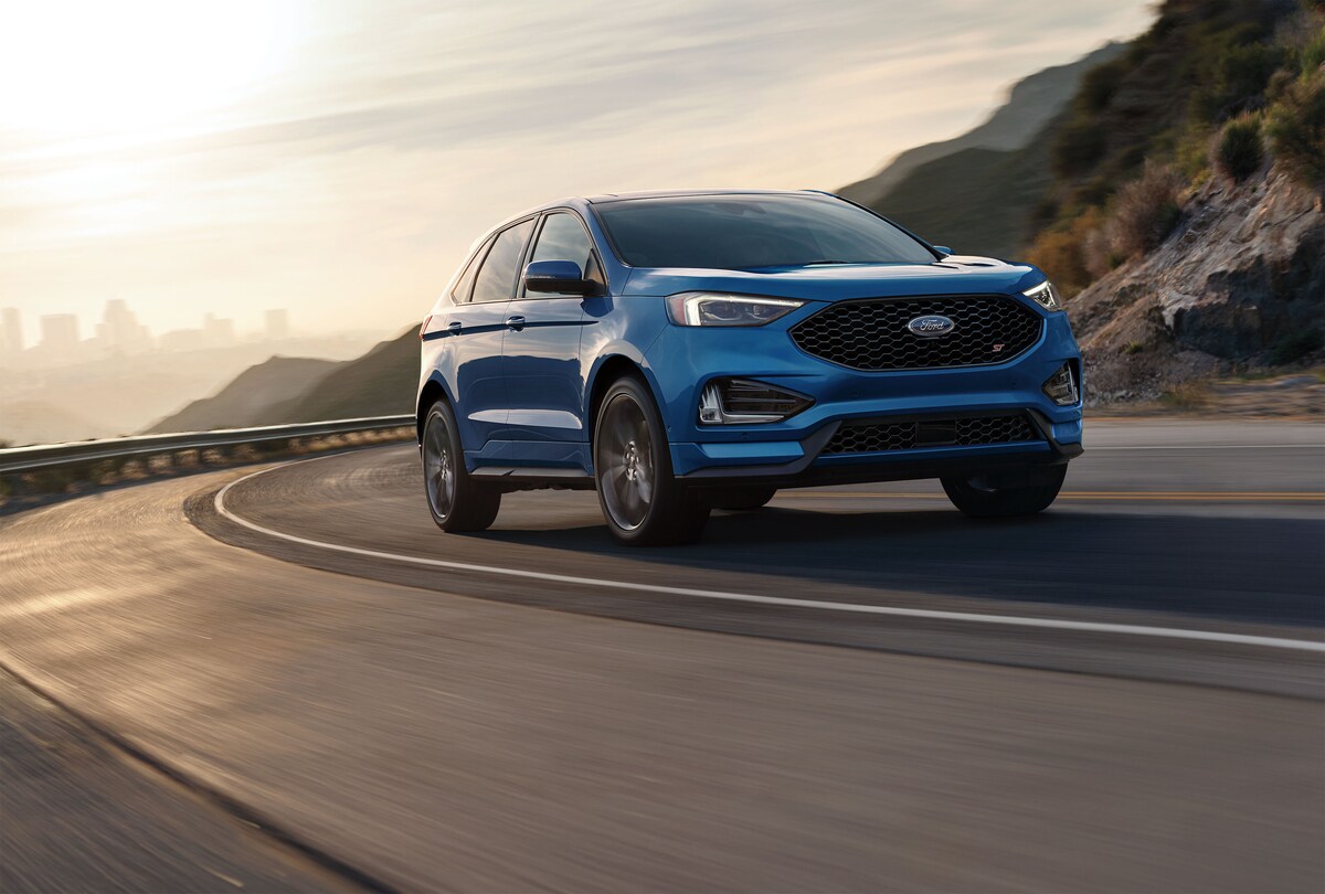 Ford Edge Driving in Sunset New Ford Edge SUV Newfane, NY