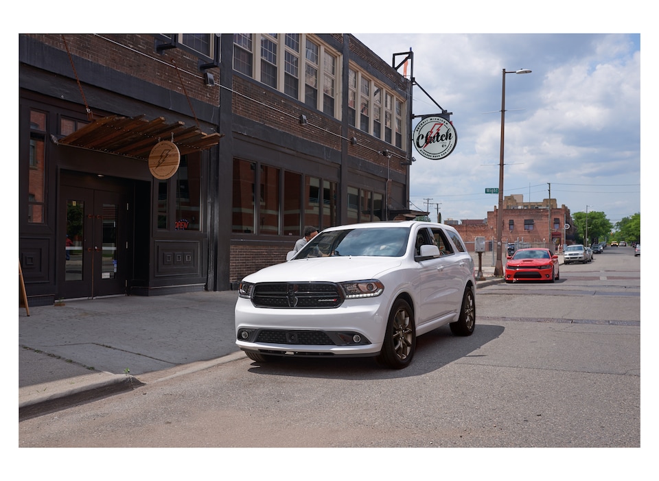 2018 Dodge Durango GT SUV white parked on street.jpeg