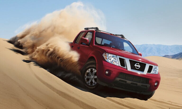 2021 Nissan Frontier exterior offroad in sand