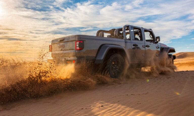 2022 Jeep Gladiator kicking up sand