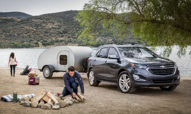 2021 Chevy Equinox exterior family at campsite by river