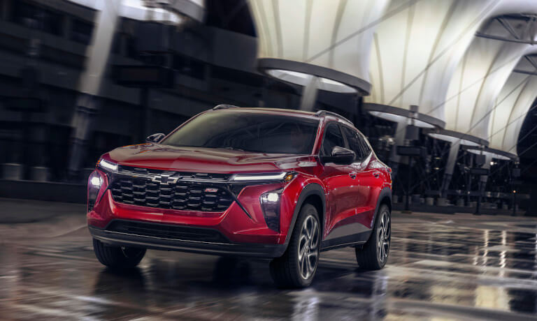 2024 Chevy Trax driving in a warehouse