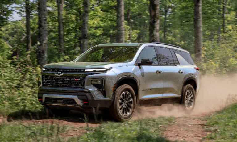 2025 Chevy Traverse driving on forest trail