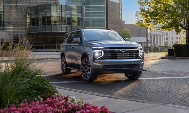 2025 Chevy Tahoe parked by office building
