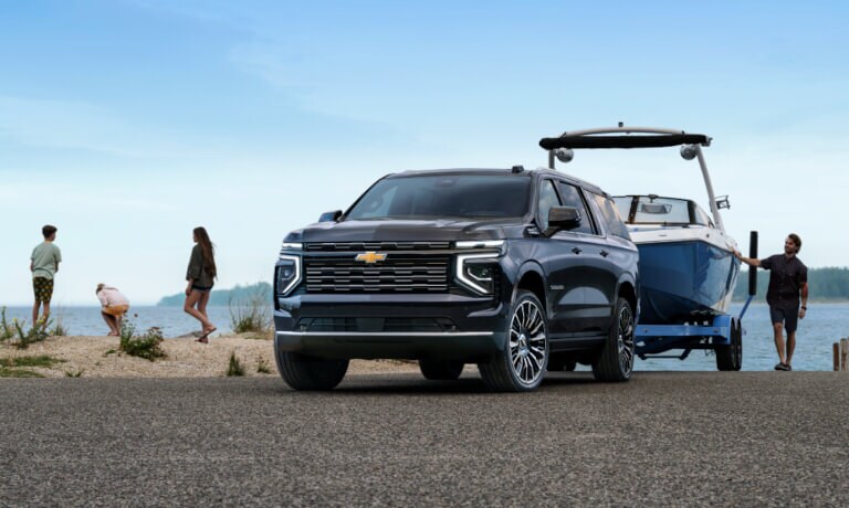 2025 Chevy Suburban pulling a boat from the water