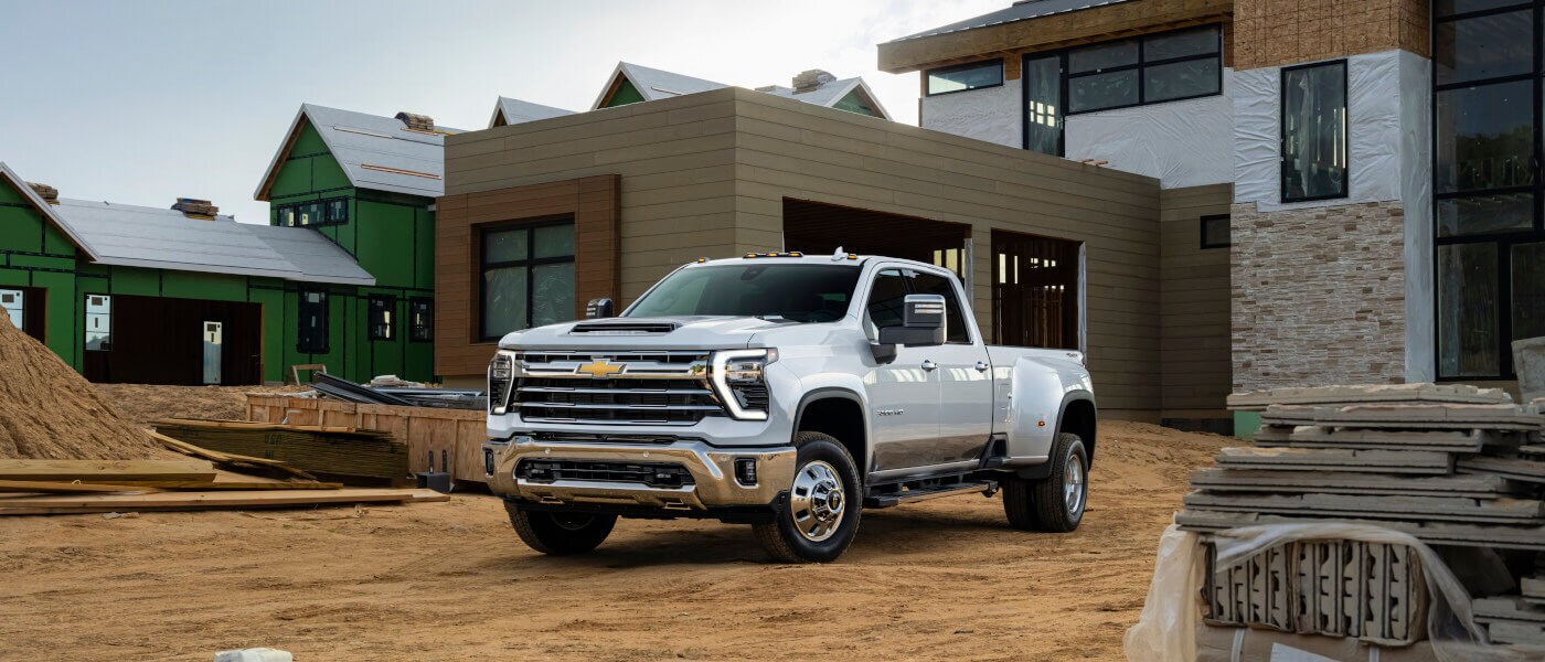 2025 Chevy Silverado 3500 HD parked outside a newly constructed home