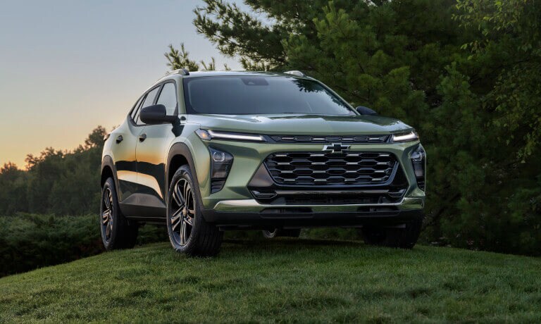 2026 Chevy Trax parked on a grassy hill