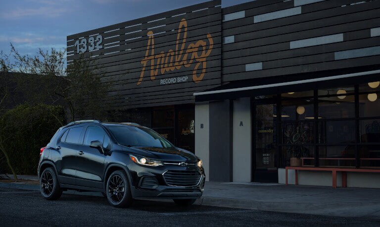 2022 Chevy Trax parked in front of record shop