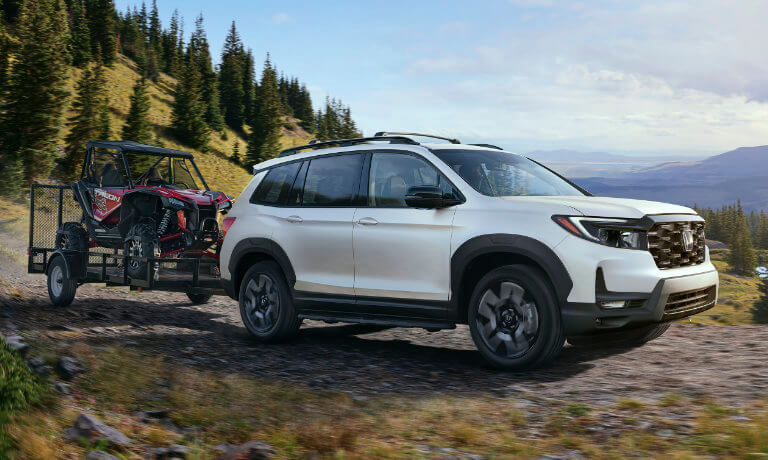 2022 Honda Passport towing an ATV