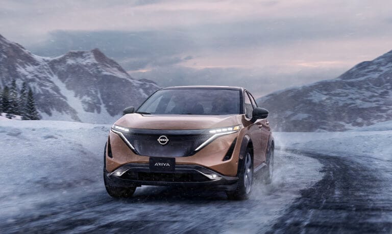 2023 Nissan ARIYA driving in the snow