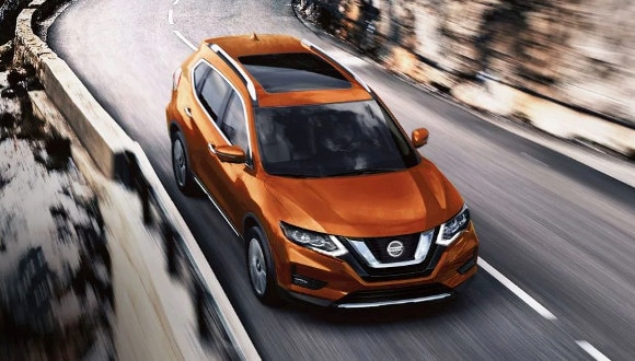 2020 Nissan Rogue towing a boat
